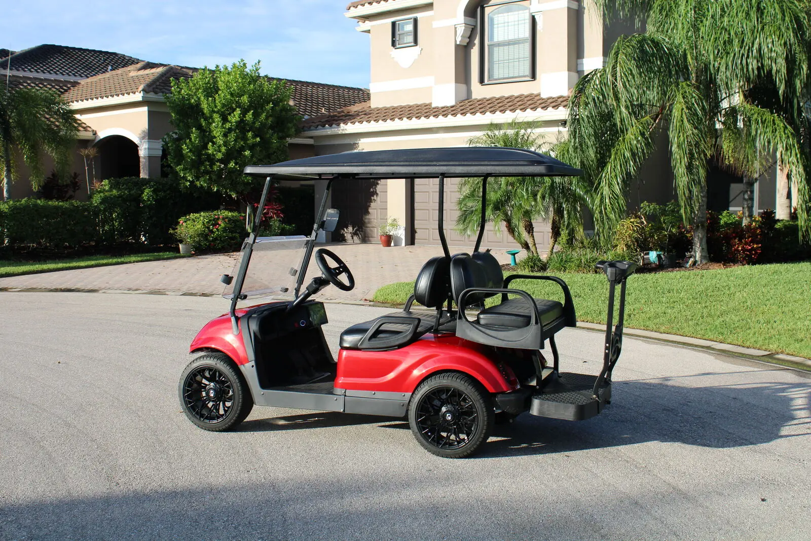 Rover cart parked in a neighborhood driveway